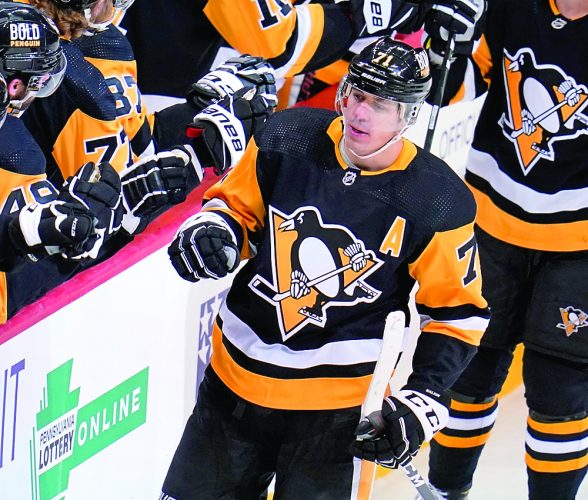 Penguins hold on at the end